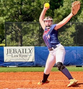 Addi Bescher winding up pitch on softball field