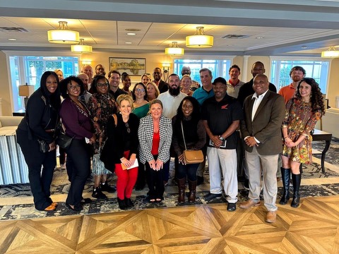 members of Leadership Florence posing for a photo in a ballroom setting